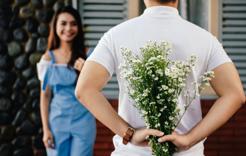 A man is appreciating his wife by offering flowers - loneliness in marriage